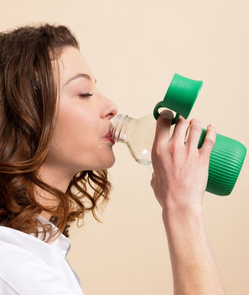 woman drinking in a bottle