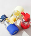 blue, yellow and red glass bottles